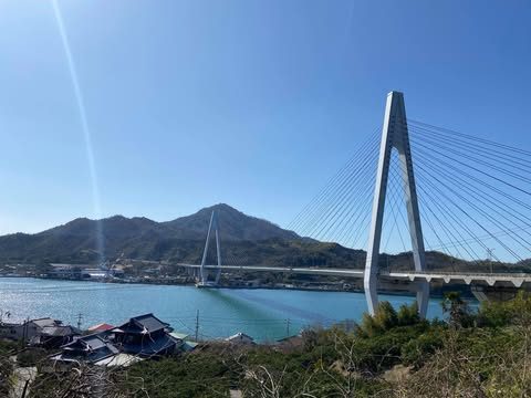 Tatara Bridge spanning the turquoise Seto Inland Sea — Setouchi
