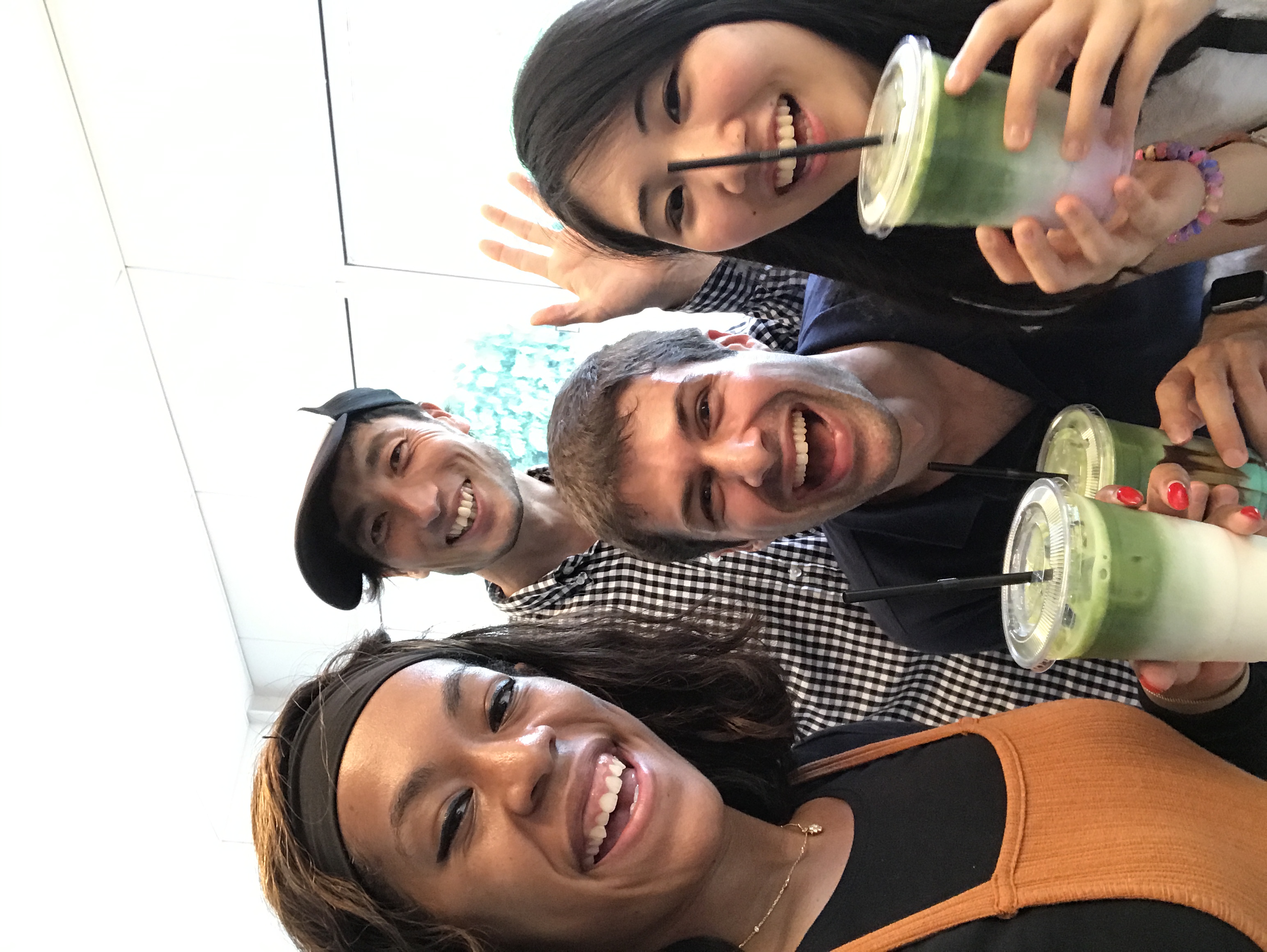 Evan with friends drinking matcha after visiting tea farmers