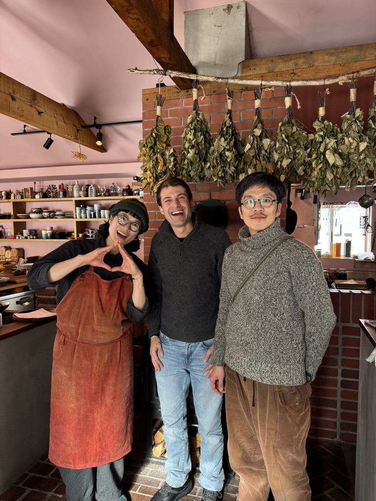 Evan with the owners of a herb cafe in rural Japan